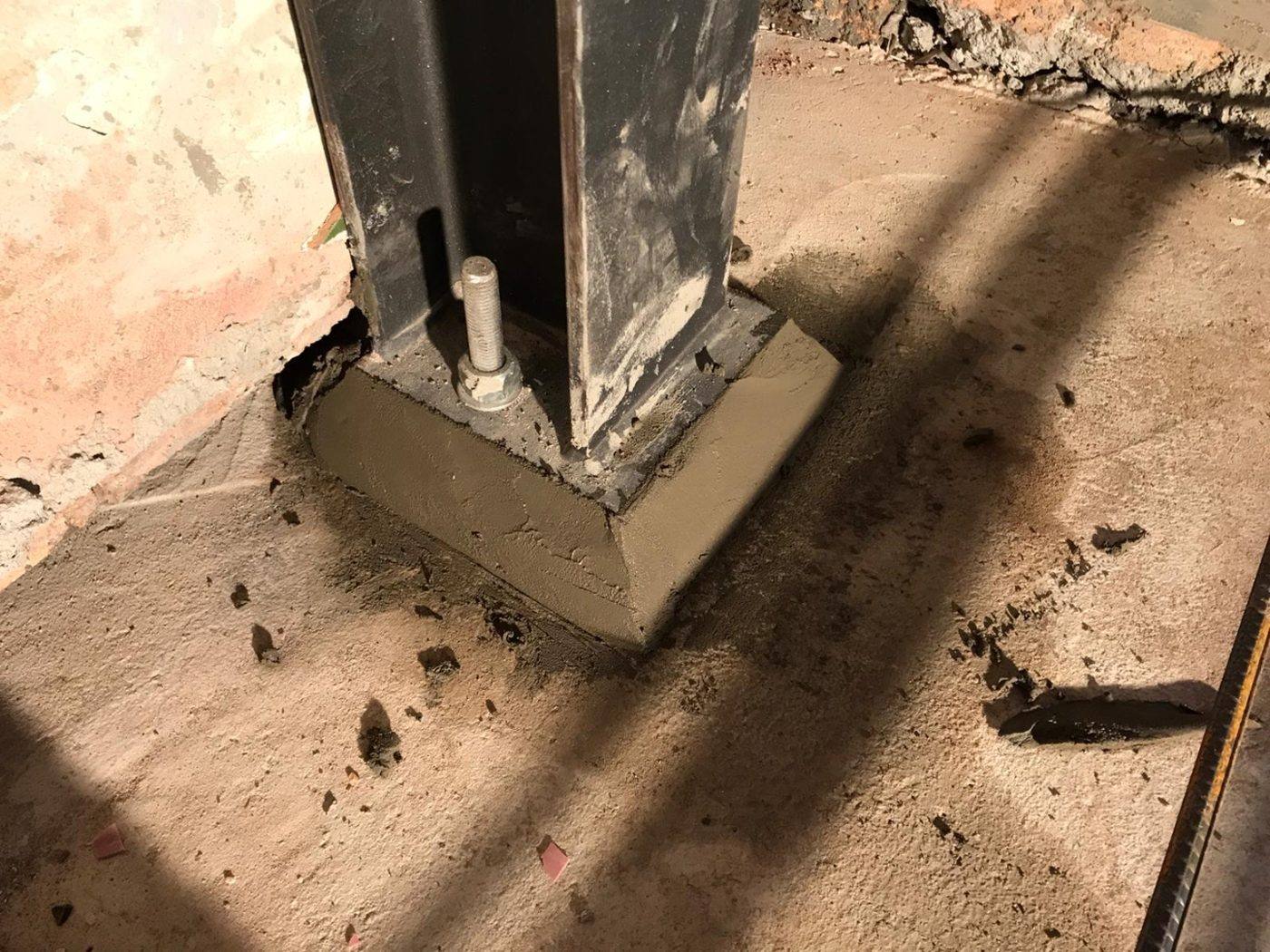 Steel column base plate bolted onto a pad footing, Dulwich Hill by Loel Homes